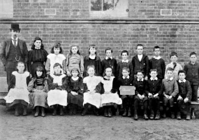 Class V group at Cheltenham State School, John Allnutt second from the right in the front row [picture].
