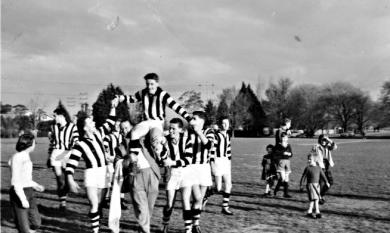 Leo Gamble captain of the Mentone CYMS team, being 'chaired' off after a semi-final win in 1957 [picture].