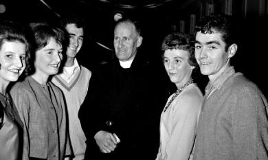 Father G Quilter parish priest of St Agnes Catholic Church Highett with some young parishioners [picture].
