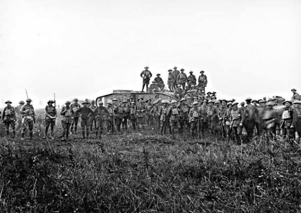 Australian soldiers pose with a British tank crew at Lamotte during first World War [picture].