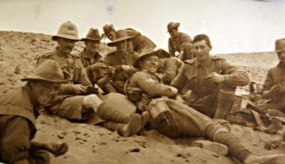 WW1 mena Camp Egypt, Australian soldiers resting after March in sand [picture].