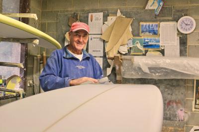 Phil Trigger shaping surfboard.