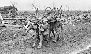 Australiam stretcher-bearers carrying a wounded man through the mud [picture].