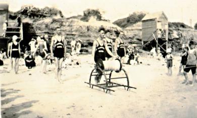 Reel and Line Team at Parkdale Life Saving Club, club house on the left, bathing box on stilts to the right and team members C Cornish, J Jones [picture].