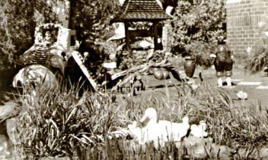 Fairy House featuring the Old Woman in a Shoe, a wishing well, and a family of ducklings, Nepean Highway Cheltenham [picture].