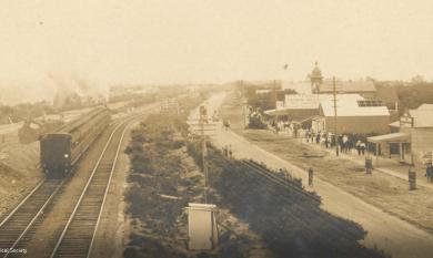 Main Street Chelsea with dual track railway line [picture].