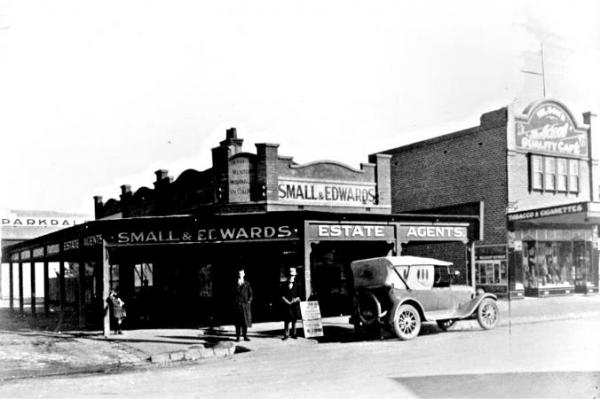 Small & Edwards Estate Agents on Como Parade Parkdale with Norman Thomas on the left and Geoff Connard, c1930 [picture].