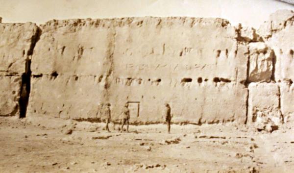 Wall with ancient heiroglyphics at the Mena Camp Egypt [picture].