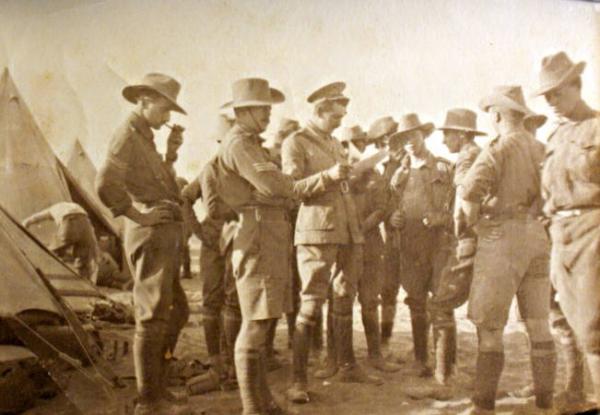 Soldiers receiving instructions, Schultz, Crellin and Capes at Mena Camp Egypt [picture].