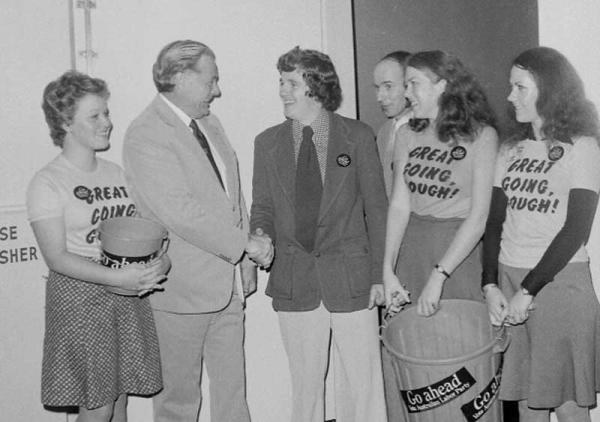 Dr Jim Cairns and supporters with candidate Tony Ross at election rally 1974 [picture].